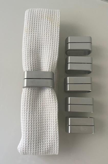 KEA SPALT set van 6 aluminium servetringen/naamkaarthouders, Ophalen of Verzenden, Rvs of Chroom