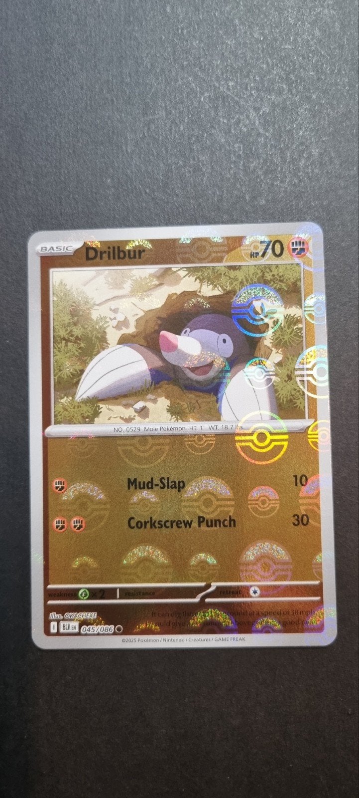 Drilbur Pokeball xBLK 045, Ophalen of Verzenden, Zo goed als nieuw, Losse kaart, Foil