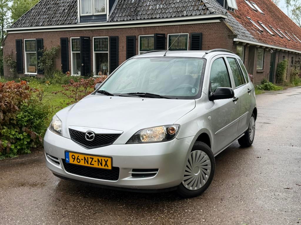 Mazda 2 1.4 Automaat | APK 03-2027 | NAP | Trekhaak |, Auto's, 40 €/maand, Zwart, 4 cilinders, Origineel Nederlands
