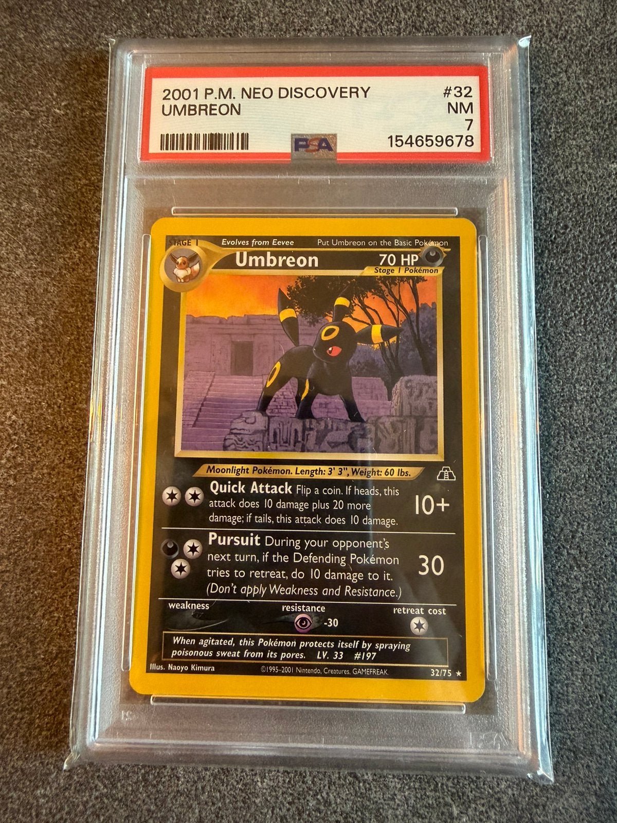 Umbreon 32 Pokémon Neo Discovery Graded PSA 7, Ophalen of Verzenden, Zo goed als nieuw