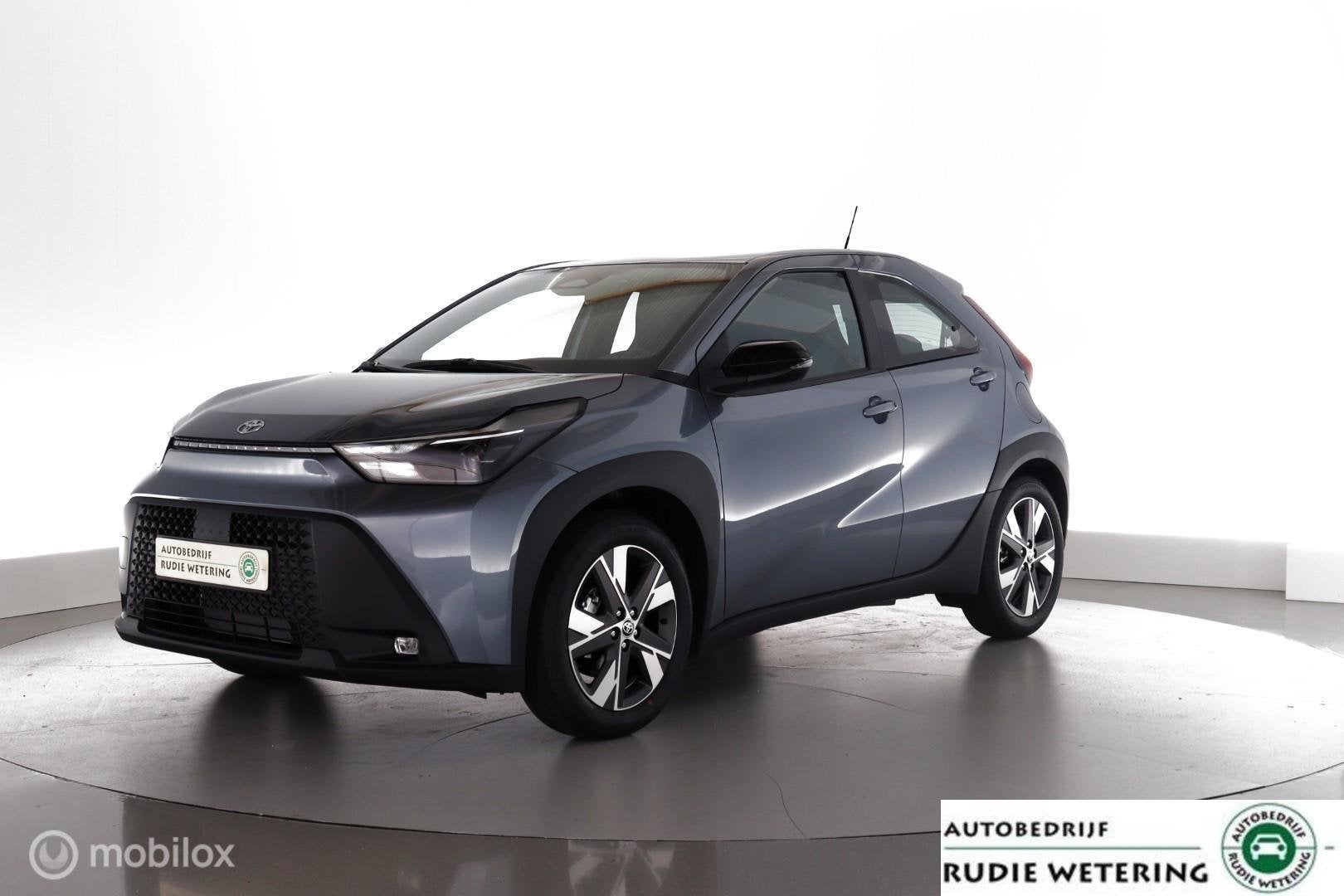 Toyota Aygo X Hybrid 115 pulse dab|cam|carplay|lmv17, Auto's, Toyota, Automatische klimaatregeling, Stof, Gebruikt, Zwart