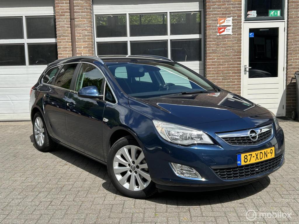 Opel Astra Sports Tourer 1.4 Turbo Anniversary Edition, Auto's, Voorwielaandrijving, Euro 5, Stof, Gebruikt