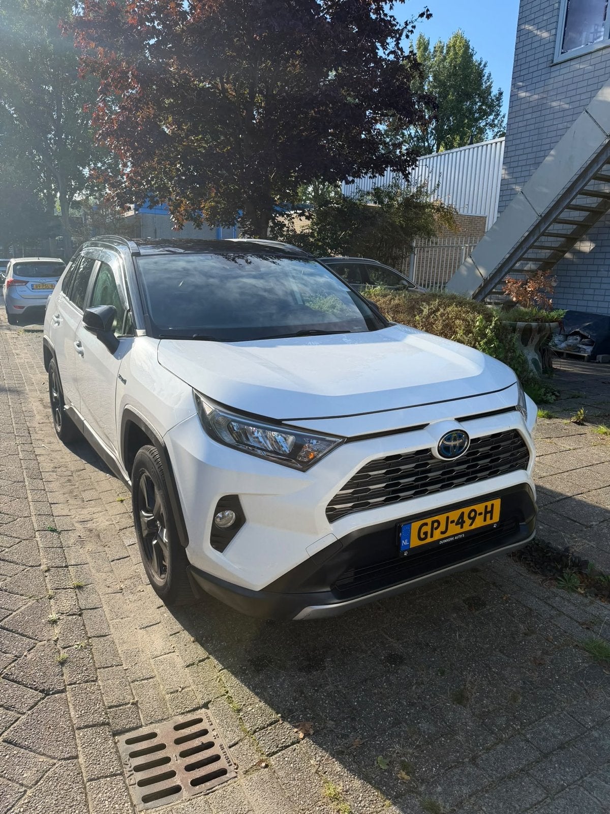 Toyota Rav4 2.5 Hybrid 218pk CVT 2019 Wit, Auto's, 4 cilinders, 2487 cc, Wit, 1565 kg