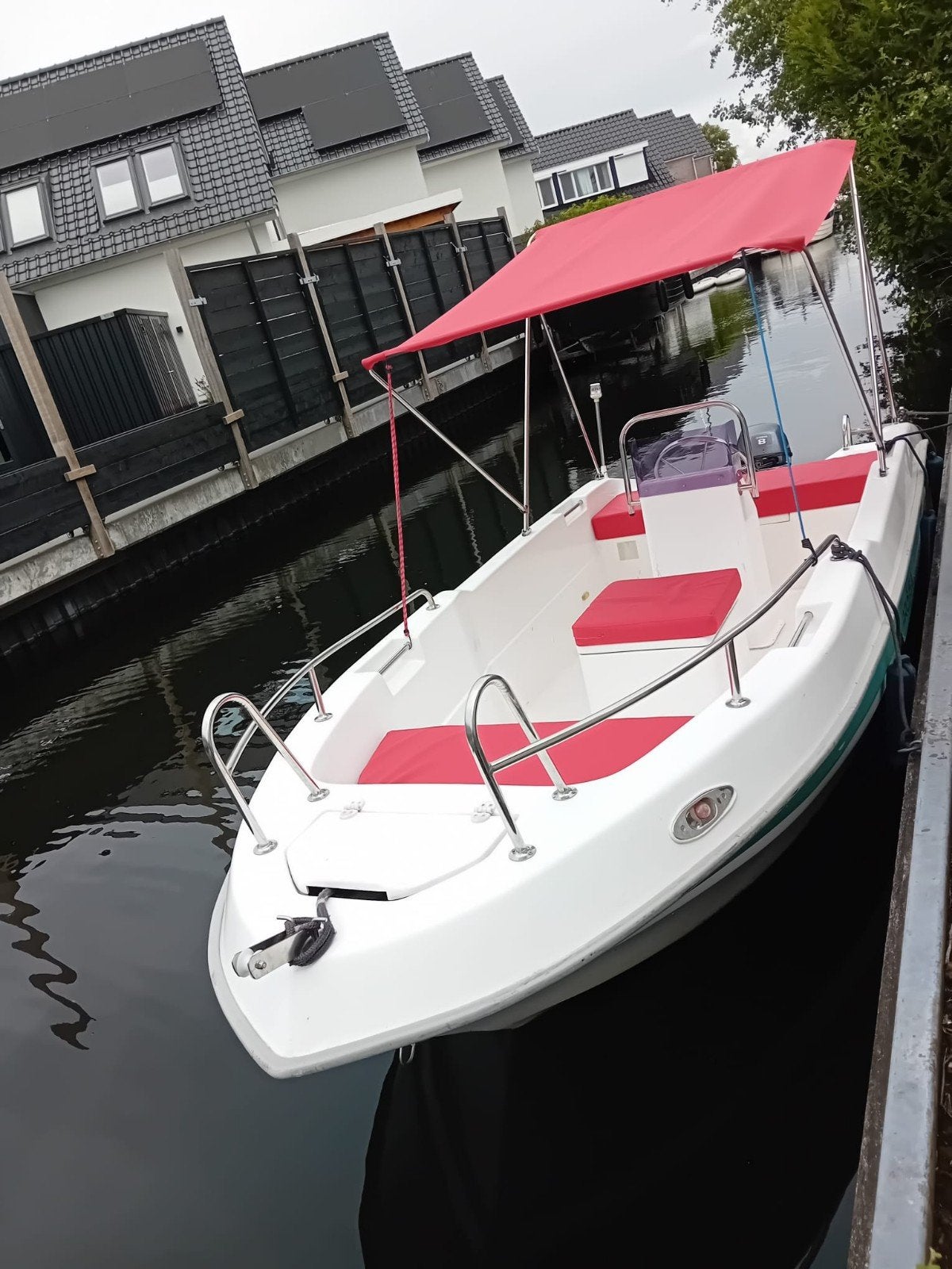 Nette boot met buitenboordmotor en biminitop, Gebruikt, Buitenboordmotor, Ophalen of Verzenden, Consoleboot