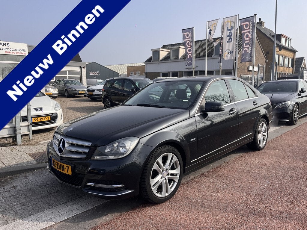 Mercedes-Benz C-Klasse 180 Business Class Avantgarde, Auto's, Automaat, 1796 cc, Zwart, Origineel Nederlands