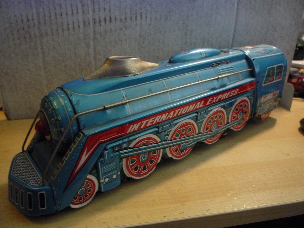 Grote oude blikken trein MF 804  International Express, Antiek en Kunst, Ophalen of Verzenden