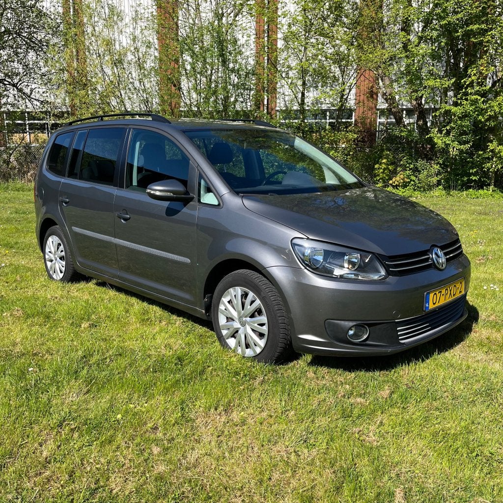 Volkswagen Touran 1.2 TSI Grijs 2011 Benzine, Auto's, Euro 5, 4 cilinders, Origineel Nederlands, 75 €/maand
