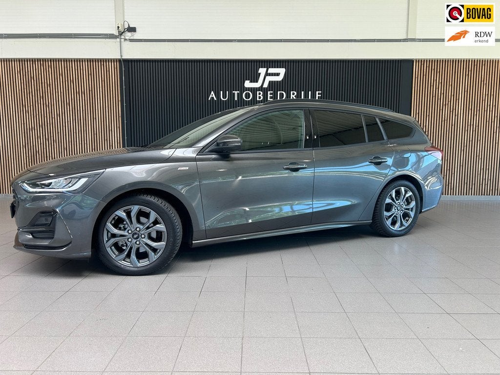Ford Focus Wagon 1.0 EcoBoost Hybrid ST Line ACC|Applecarpla, Gebruikt, Met garantie (alle), 19 km/l, Hybride Elektrisch/Benzine