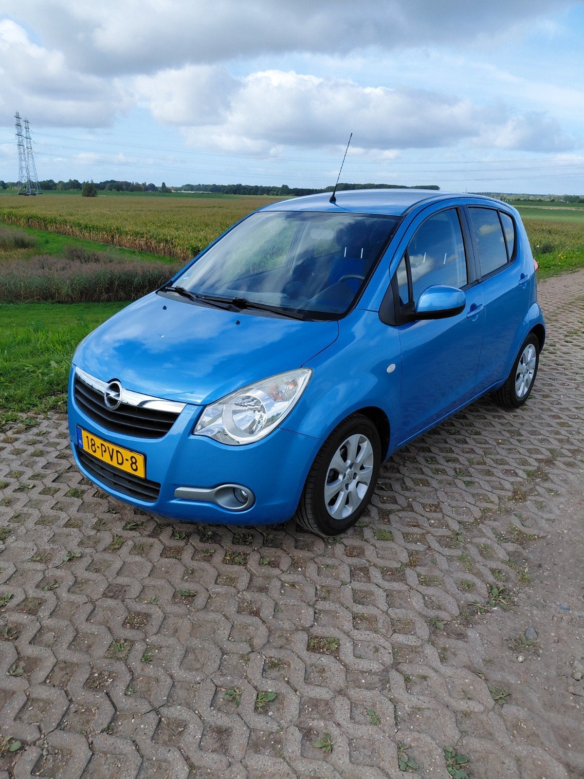 Opel Agila 1.2 16V 2011 Blauw, Auto's, Voorwielaandrijving, Dealer onderhouden, Stof, 40 €/maand