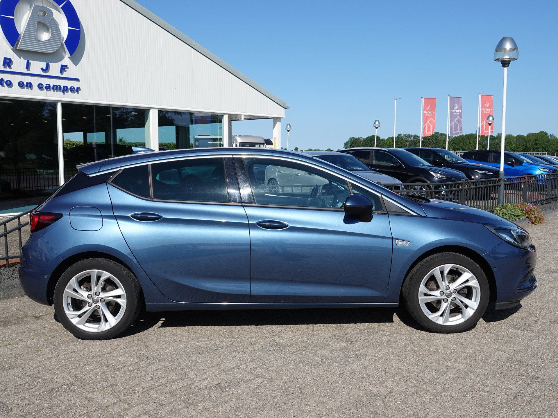Opel Astra 1.4 Innovation 150PK H-LEER | KEYLESS | SP. STOEL, Gebruikt, 4 cilinders, Blauw, Origineel Nederlands