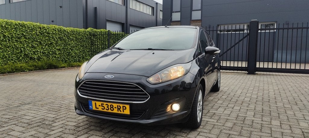 Ford Fiesta 1.0 Titanium (bj 2013), Auto's, Voorwielaandrijving, Euro 5, 525 kg, Verwarmde buitenspiegels