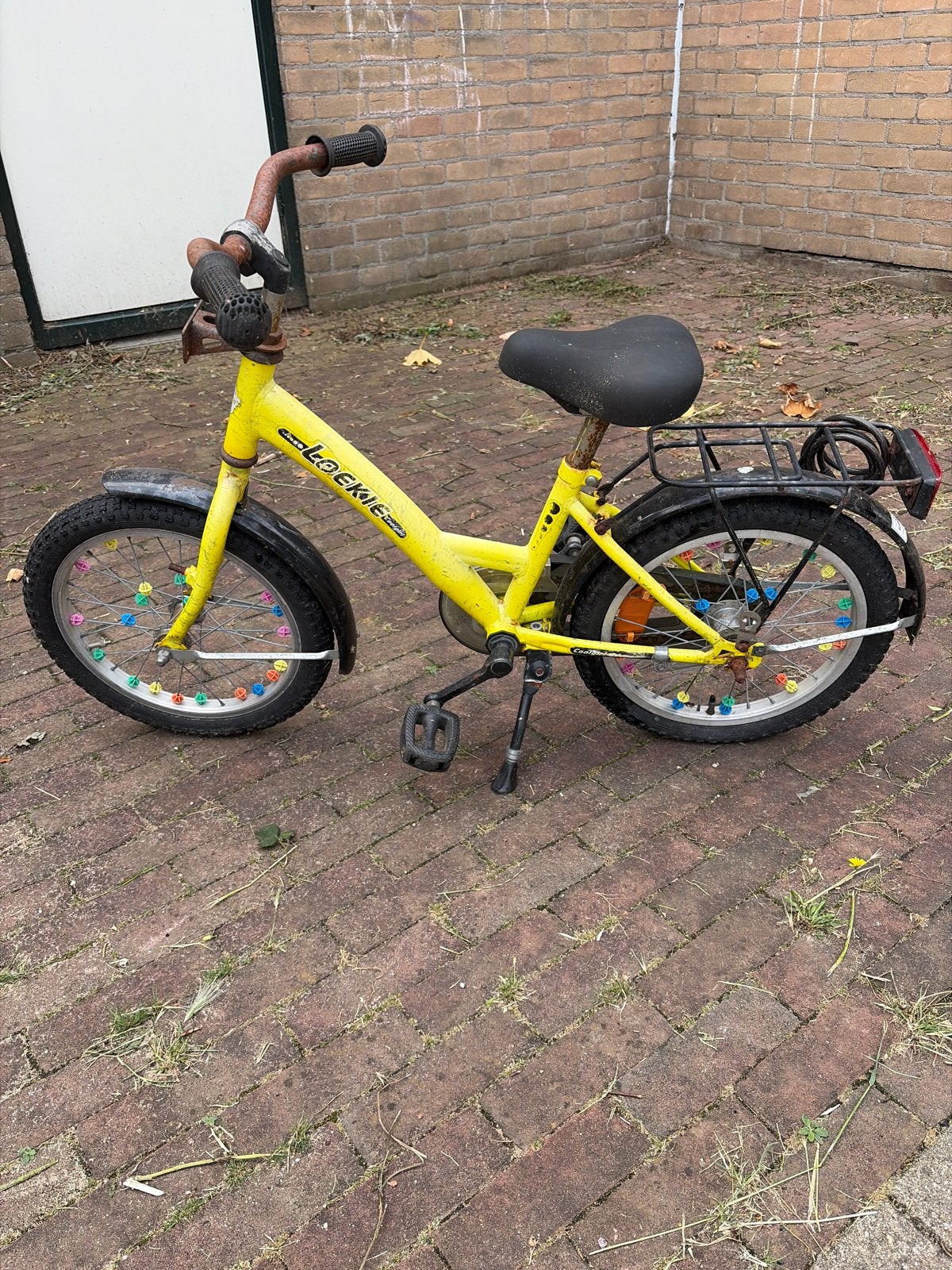 Lockie kinderfiets, geel, 16 inch, Fietsen en Brommers, Fietsen | Kinderfietsjes, Ophalen, Gebruikt, Terugtraprem, 16 tot 20 inch