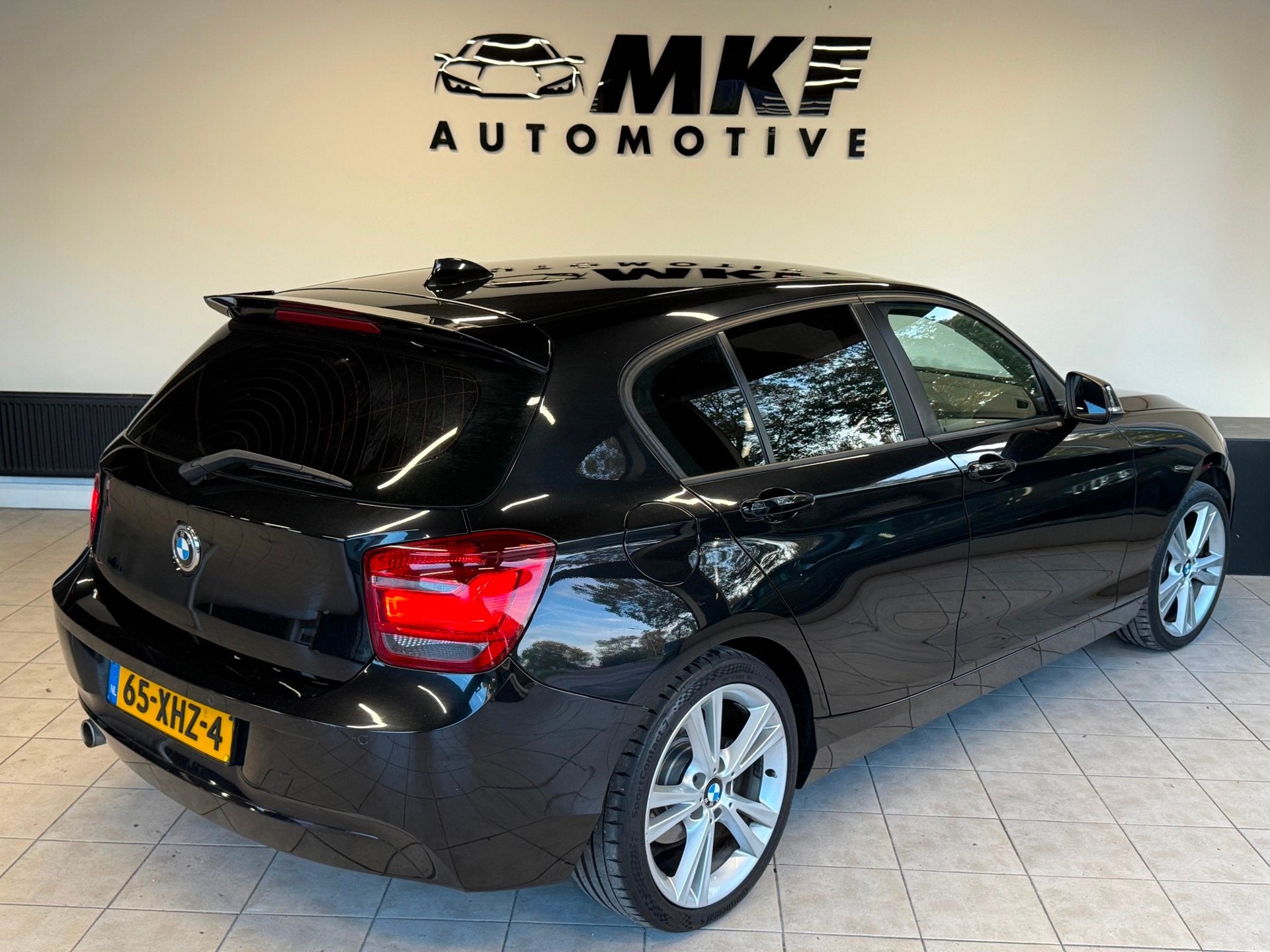 Foto 5 van BMW 1-serie 116D Business 2012 Zwart AIRCO|NAVI|XENON|NAP!