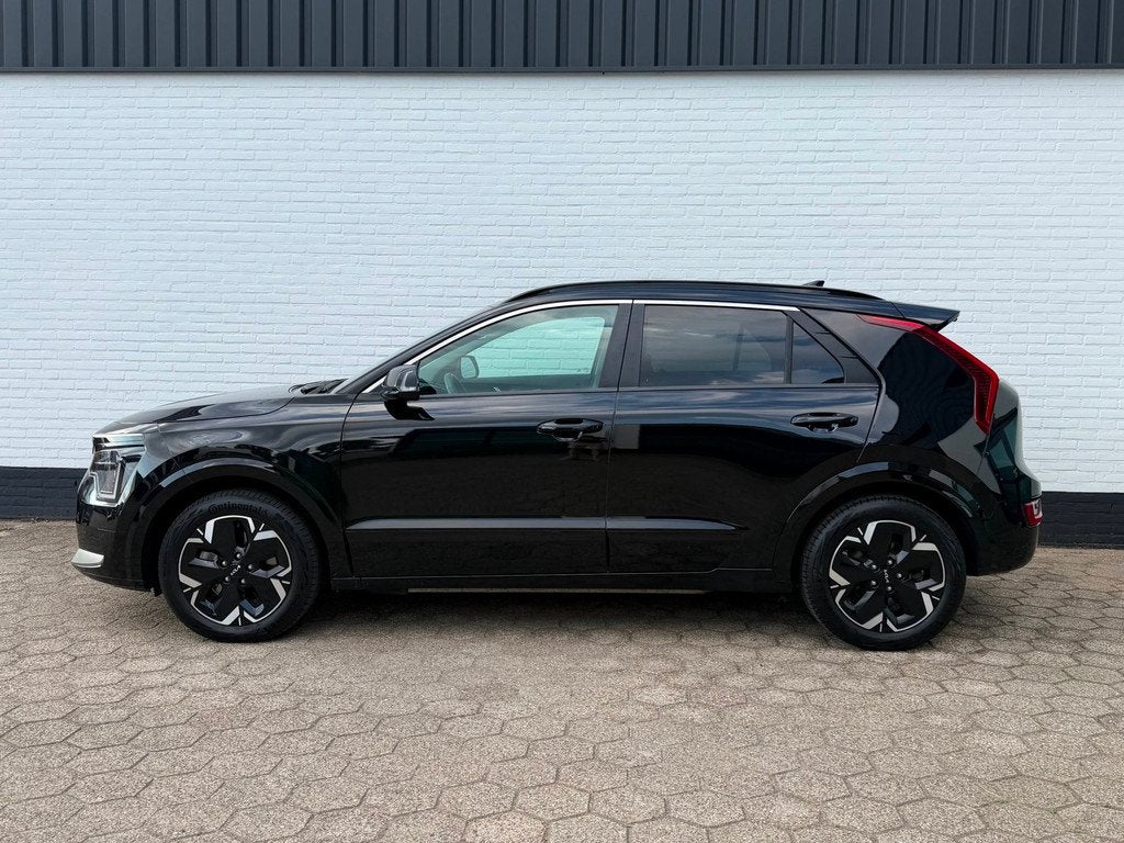 Kia Niro EV DynamicPlusLine 64.8 kWH ACC l CAMERA l SOH 99%!, Auto's, Kia, Gebruikt, 1657 kg, Leder en Stof, Zwart