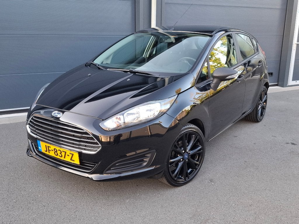 Ford Fiësta 1.25 Titanium 44KW 5DRS 2015 Zwart, Voorwielaandrijving, Stof, 40 €/maand, 4 cilinders