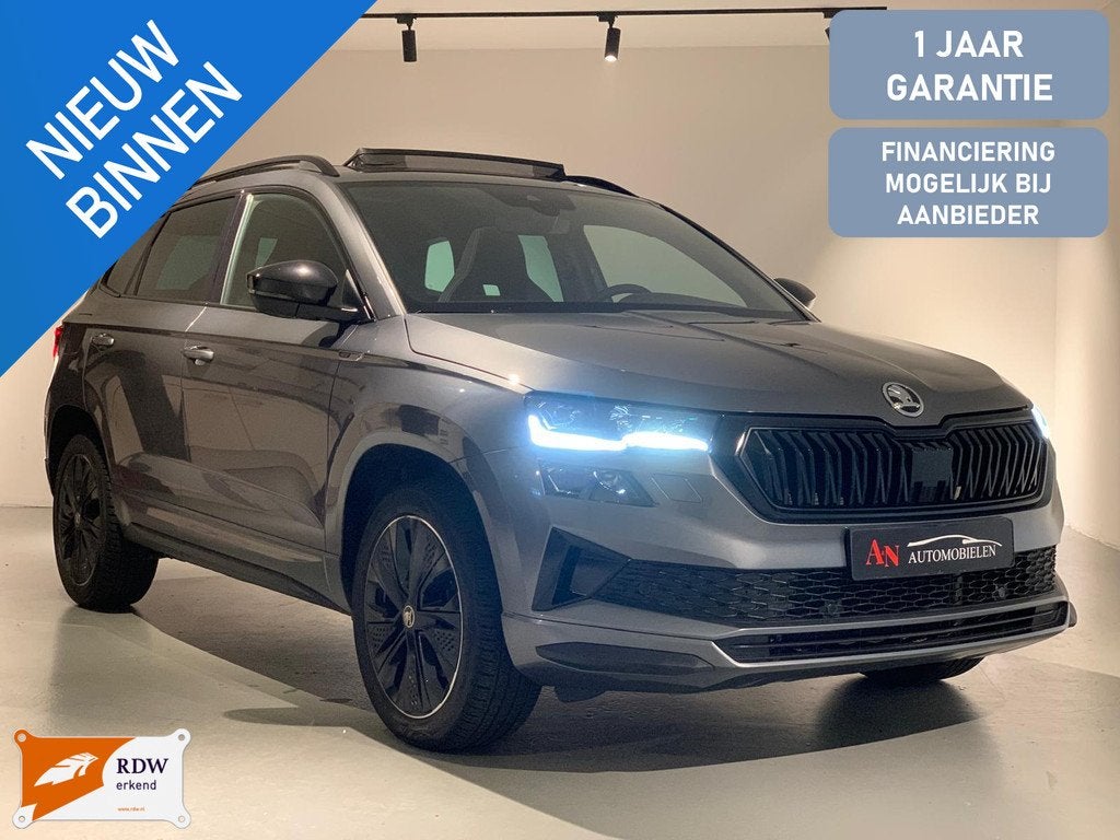 Skoda Karoq 1.5 TSI ACT Sportline Full option 1 jaar garanti, Auto's, Skoda, Stof, Euro 6, 4 cilinders, 150 pk
