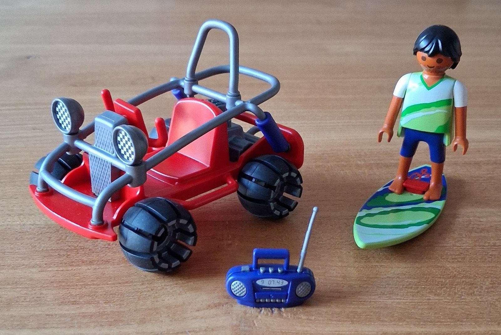 4863 Playmobil strand buggy jongen met surfplank.