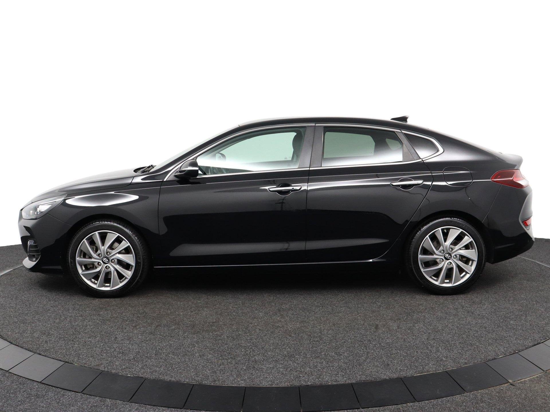 Hyundai i30 Fastback 1.0 T-GDI Premium, Auto's, Voorwielaandrijving, 12 maanden, Gebruikt, Euro 6