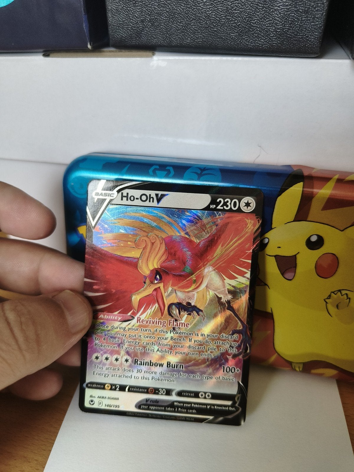 Pokémon Kaart Ho-Oh V (140/195) - Reviving Flame, Hobby en Vrije tijd, Verzamelkaartspellen | Pokémon, Ophalen of Verzenden, Zo goed als nieuw