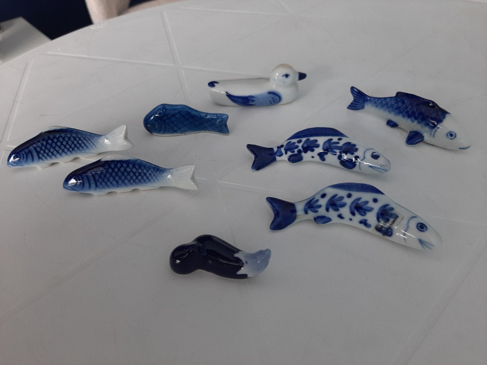 8 blauwwitte messenleggers in diverse vormen, Ophalen of Verzenden