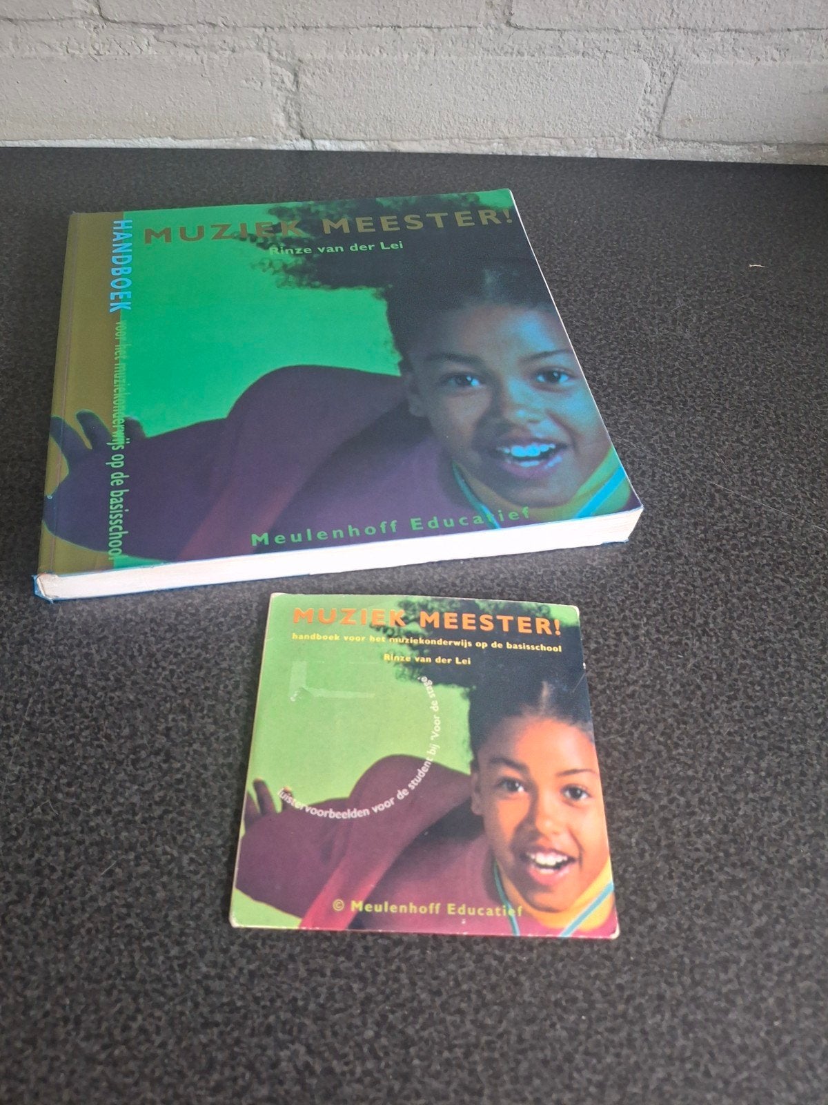 muziek meester, boek met cd, Boeken, Ophalen of Verzenden, Gelezen, Film- of Tv-bewerking