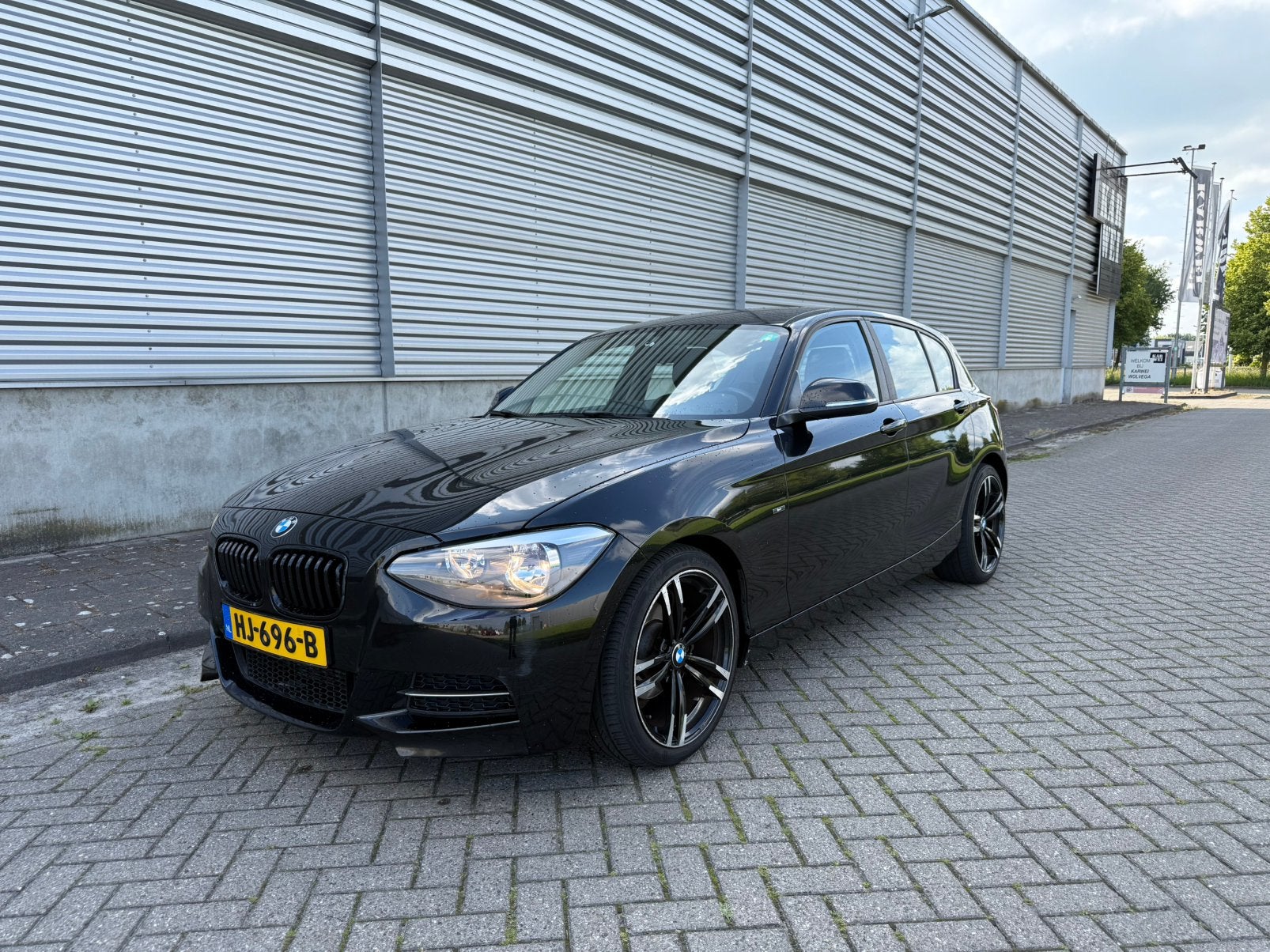 BMW 1-Serie 116D Sport Line LEDER | NAVI | PDC | STARTSTOP, Auto's, BMW, 1-Serie, Euro 5, Achterwielaandrijving, Zwart
