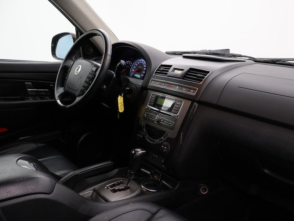 SsangYong Rexton RX 200 e-XDI 155 PK 4WD AUT. + TREKHAAK | L, Auto's, SsangYong, Gebruikt, 4 cilinders, Bruin, Leder