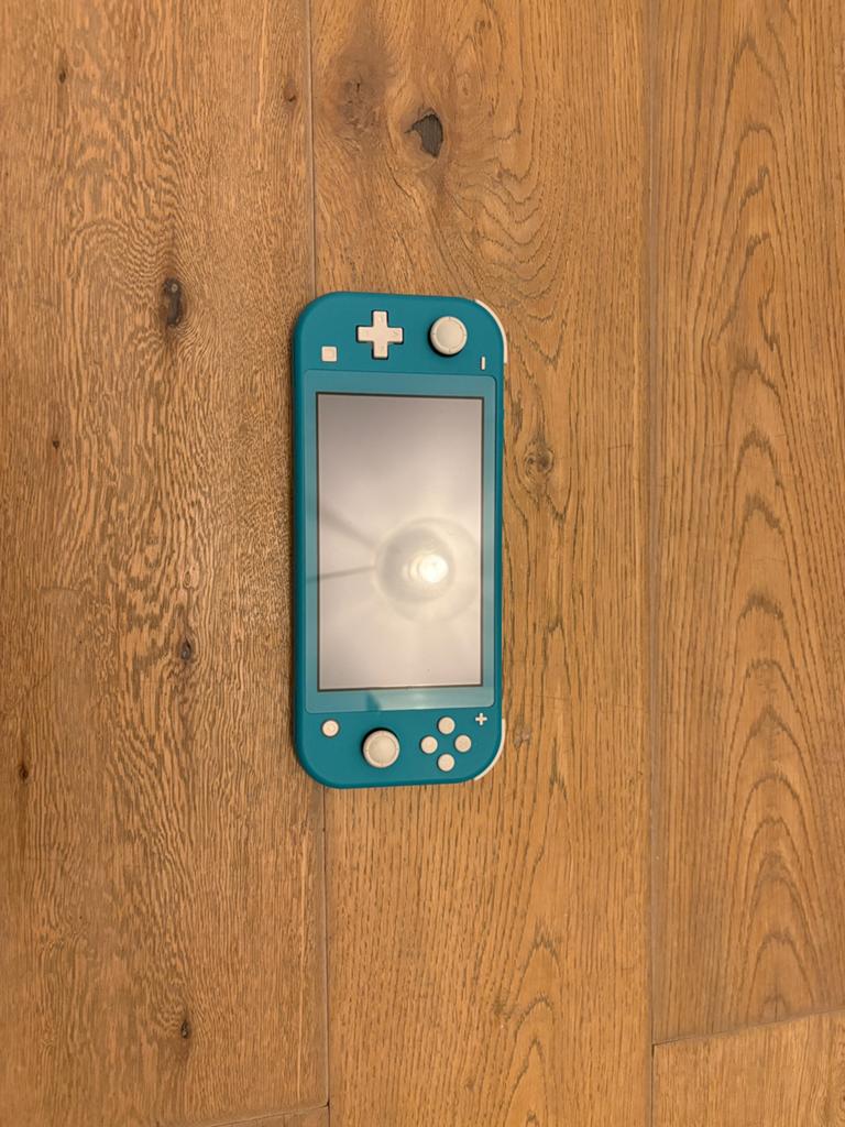 Nintendo Switch Lite Turquoise, Ophalen of Verzenden, Turquoise, Gebruikt, Met beschermhoes of tas