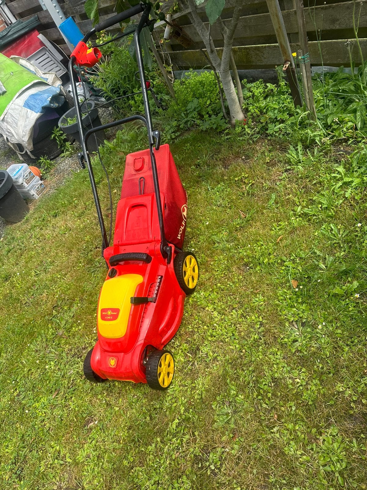 Te koop goede elektrische grasmaaier van Wolf, Tuin en Terras, Grasmaaiers, Ophalen of Verzenden, Zo goed als nieuw