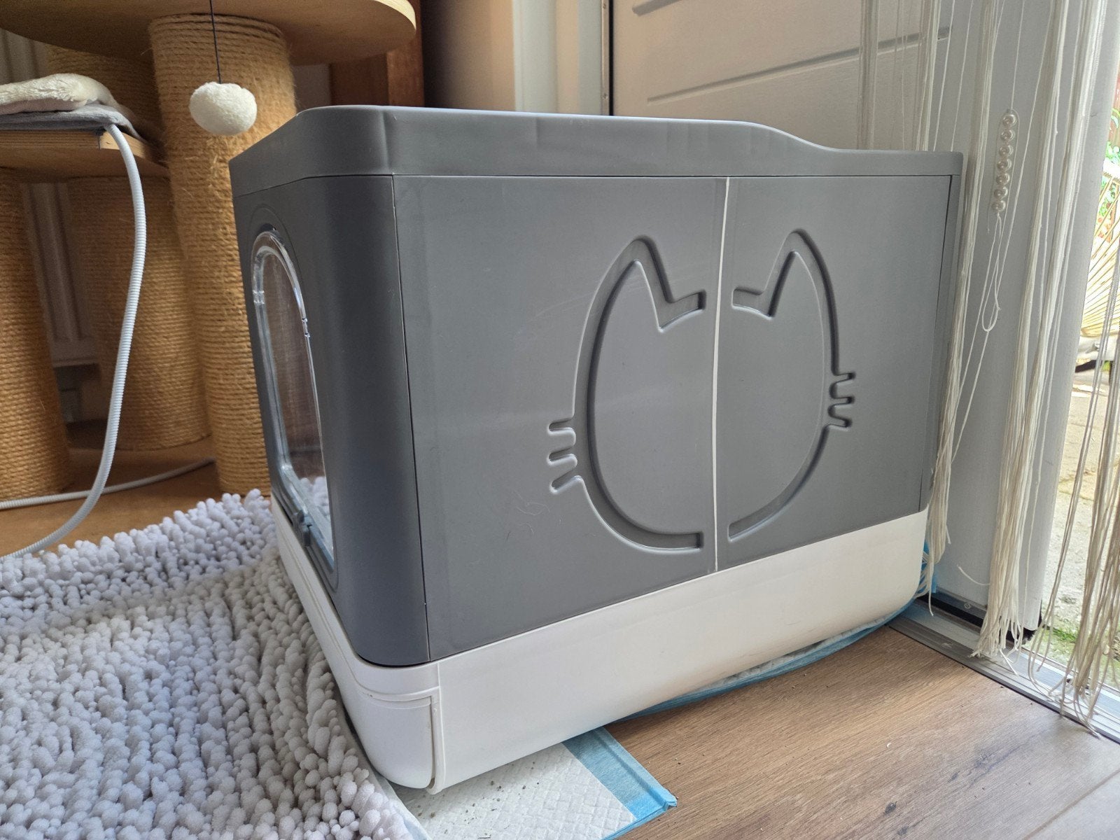 Tiaki hop-in kattenbak, Ophalen