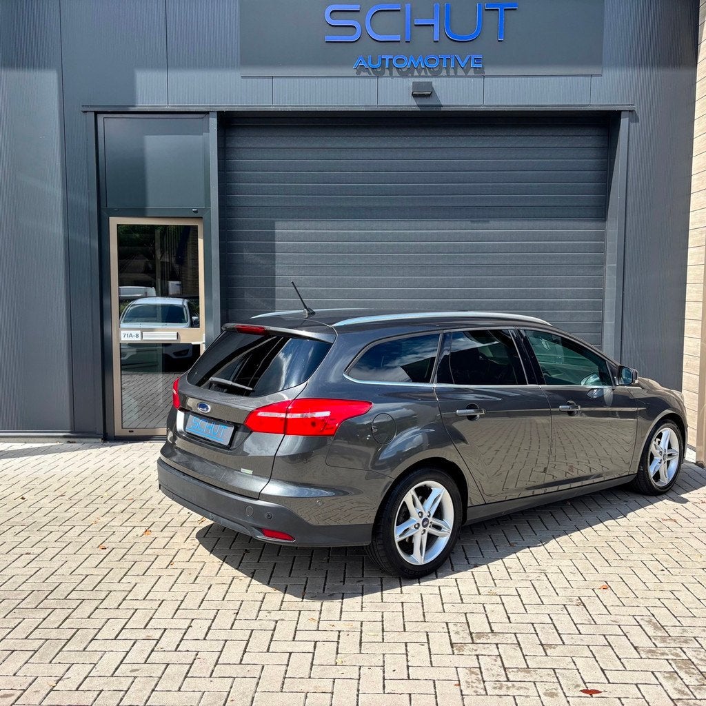 Ford Focus Wagon 125pk Titanium XENON | CLIMA | SONY SOUNDYS, Auto's, Zwart, Bi-Xenon koplampen, Origineel Nederlands, Handgeschakeld