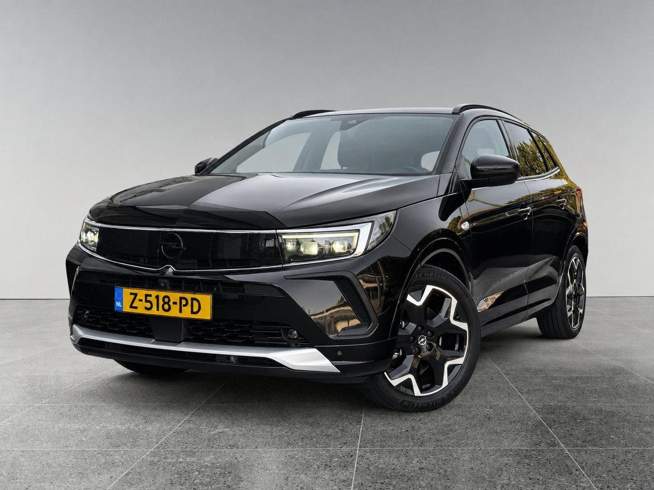 Opel Grandland Ultimate 1.6 PHEV Hybrid4 300pk e-EAT8 4x4 |, Auto's, Dealer onderhouden, 4 cilinders, 1776 kg, Alcantara