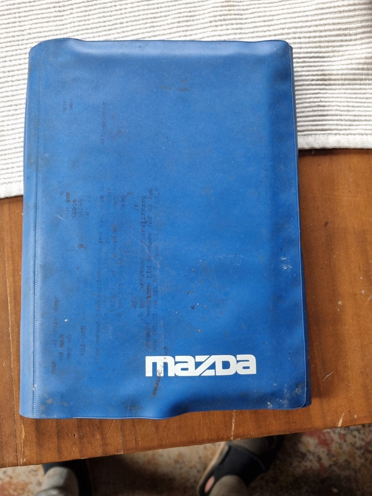 Mazda 323 Instructieboekje en Garantie-informatie, Auto diversen, Ophalen of Verzenden