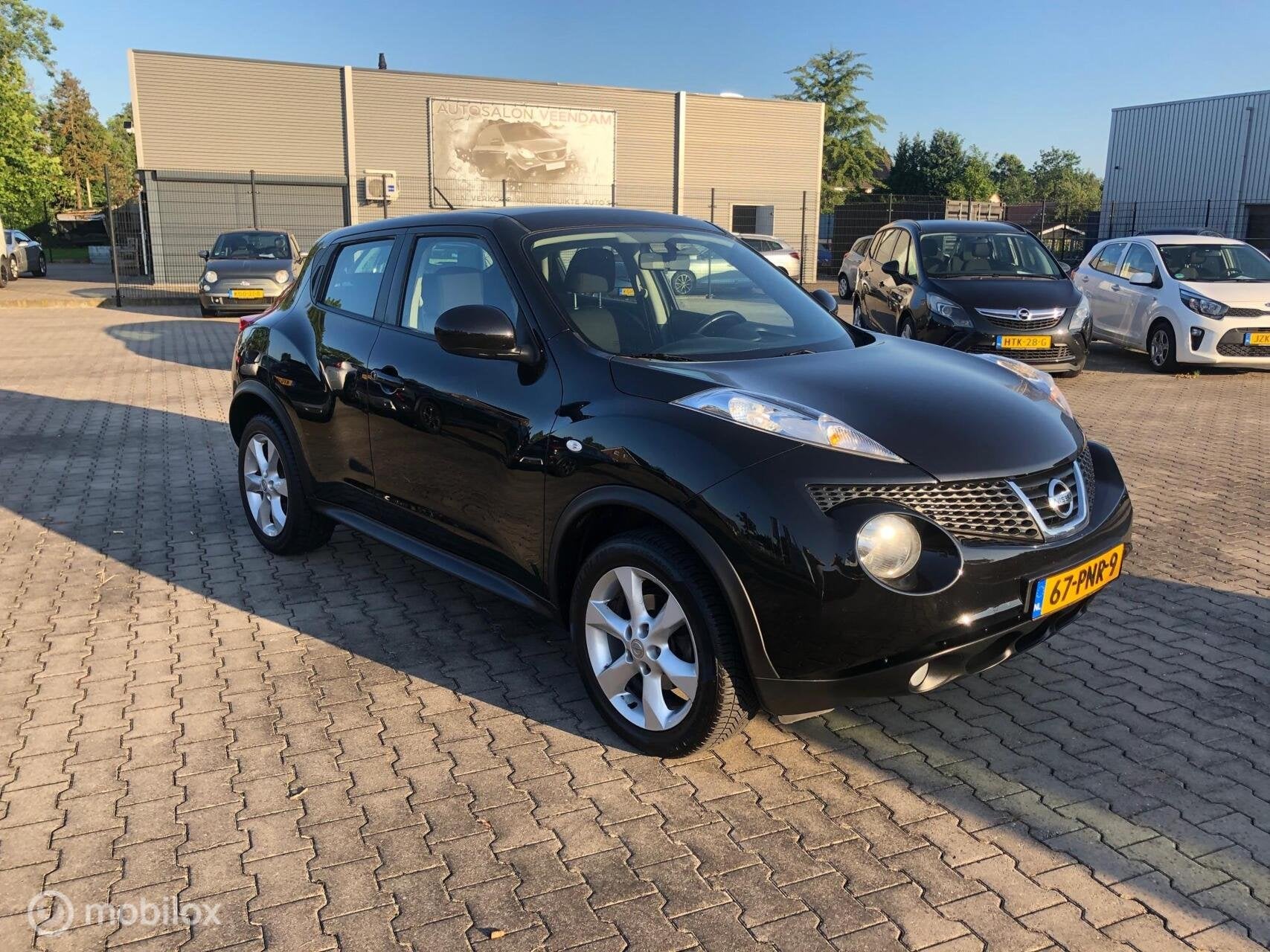 Nissan Juke 1.6 CRUISE ECC NAVI CAMERA LMV, Auto's, Nissan, Euro 5, Stof, Zwart, 4 cilinders