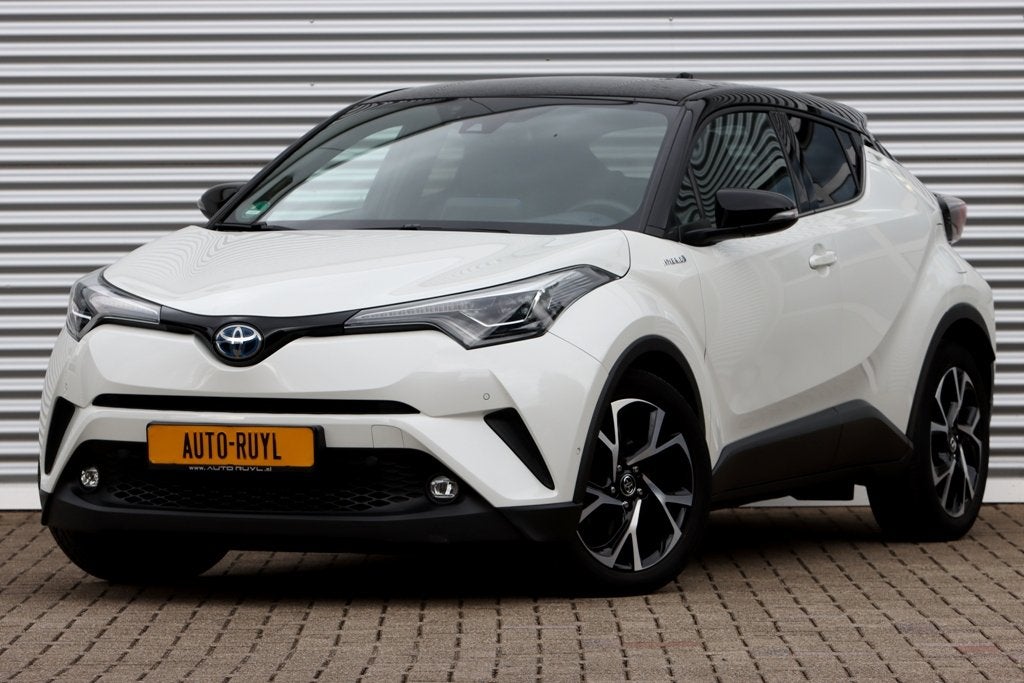 Toyota C-HR 1.8 Hybrid Premium Bi-Tone / Leer / JBL, Auto's, Dealer onderhouden, Gebruikt, Zwart, 4 cilinders