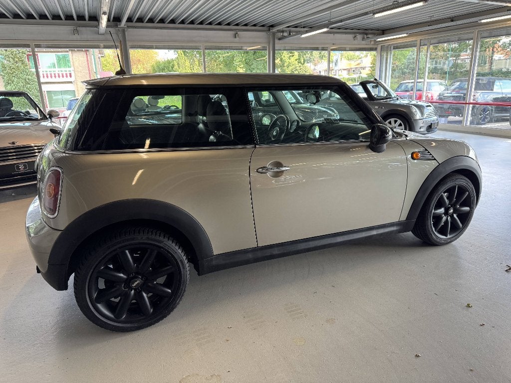 Mini 1.4 16V ONE 2007 Champagne ( 3 MAANDEN GARANTIE ), Auto's, Voorwielaandrijving, Stof, Zwart, 4 stoelen