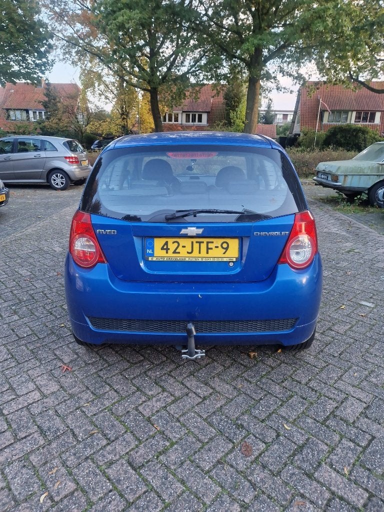 Chevrolet Aveo 1.4 16V 3D 2009 Blauw, Auto's, Voorwielaandrijving, Euro 5, Stof, 40 €/maand