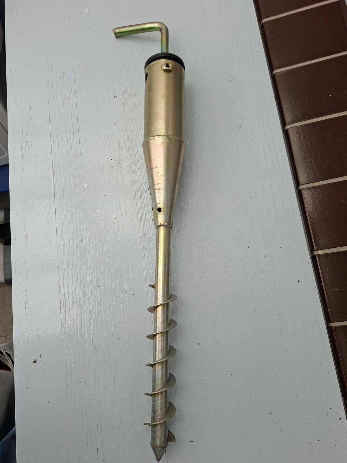 handmatige grondboor, Ophalen
