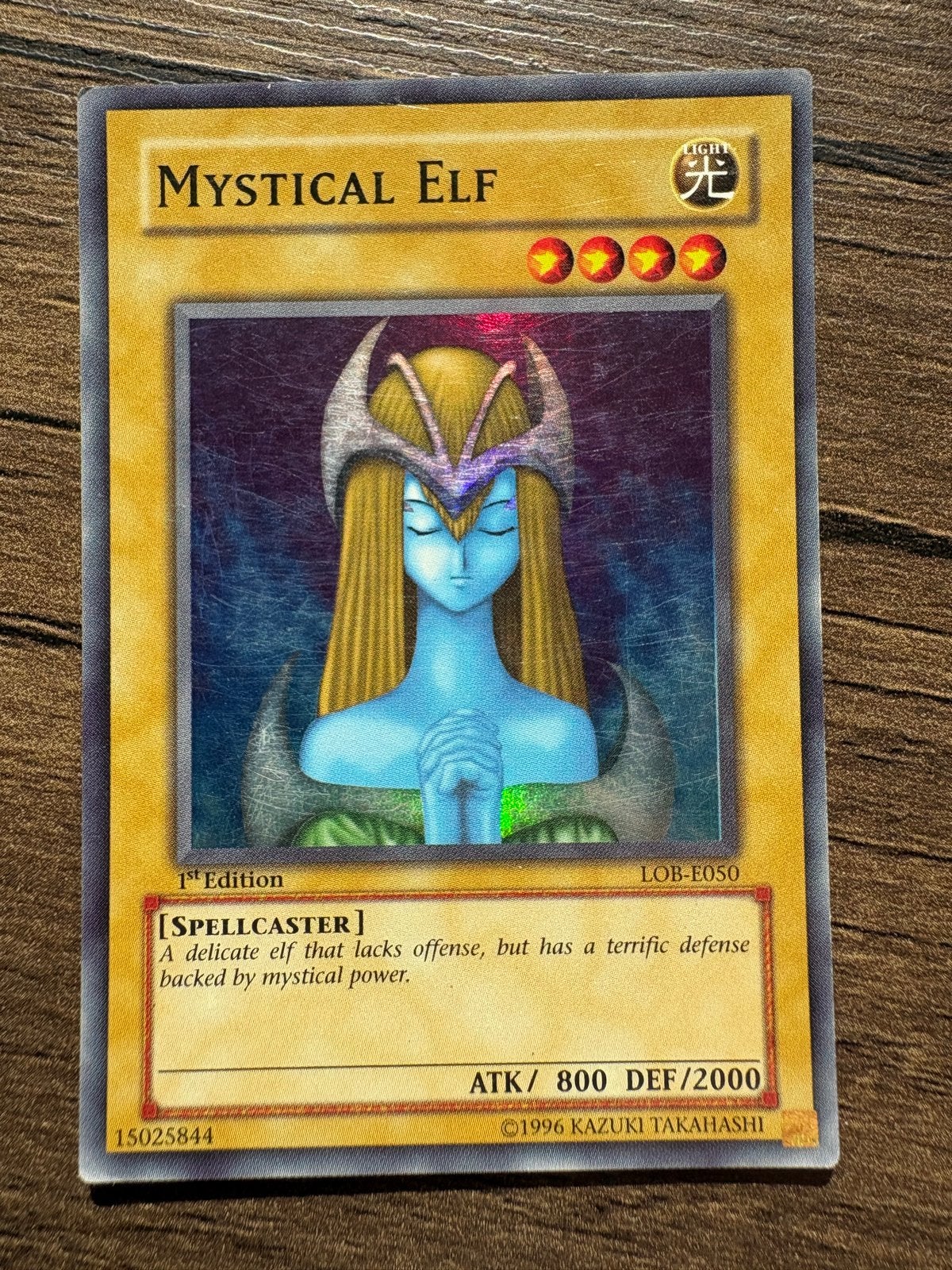 Mystical Elf holo 1st Edition (LOB-E050), Ophalen, Gebruikt, Losse kaart, Foil