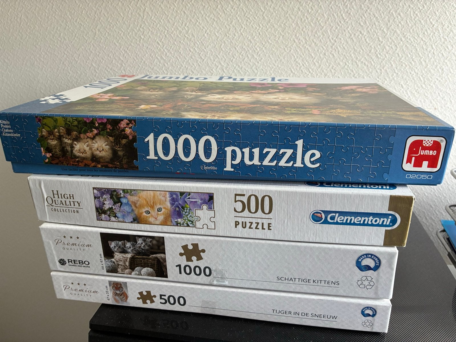 4 Puzzels met katten en tijger, 500 en 1000 stukjes: € 11,99, Ophalen of Verzenden, 500 t/m 1500 stukjes, Gebruikt, Legpuzzel