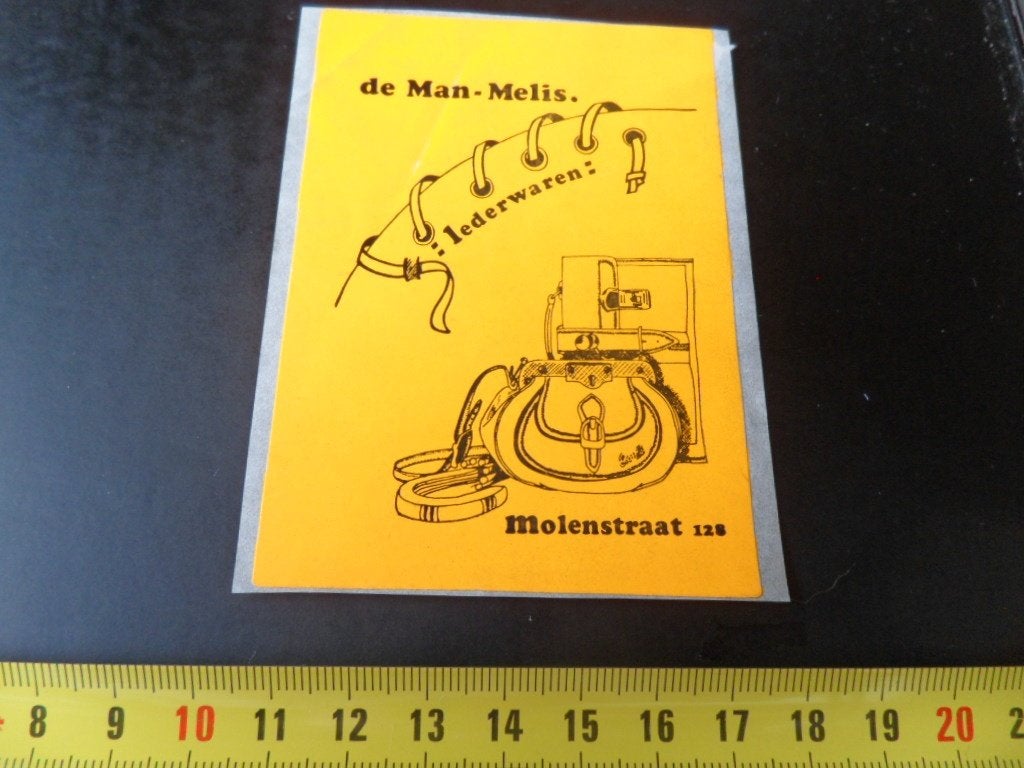 sticker tilburg de man - melis lederwaren molenstraat 128, Ophalen, Zo goed als nieuw