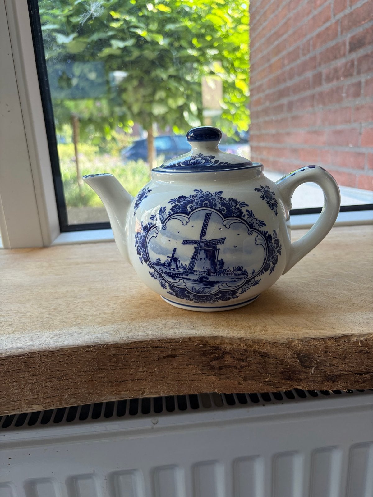 Delfts blauw theepot, Ophalen