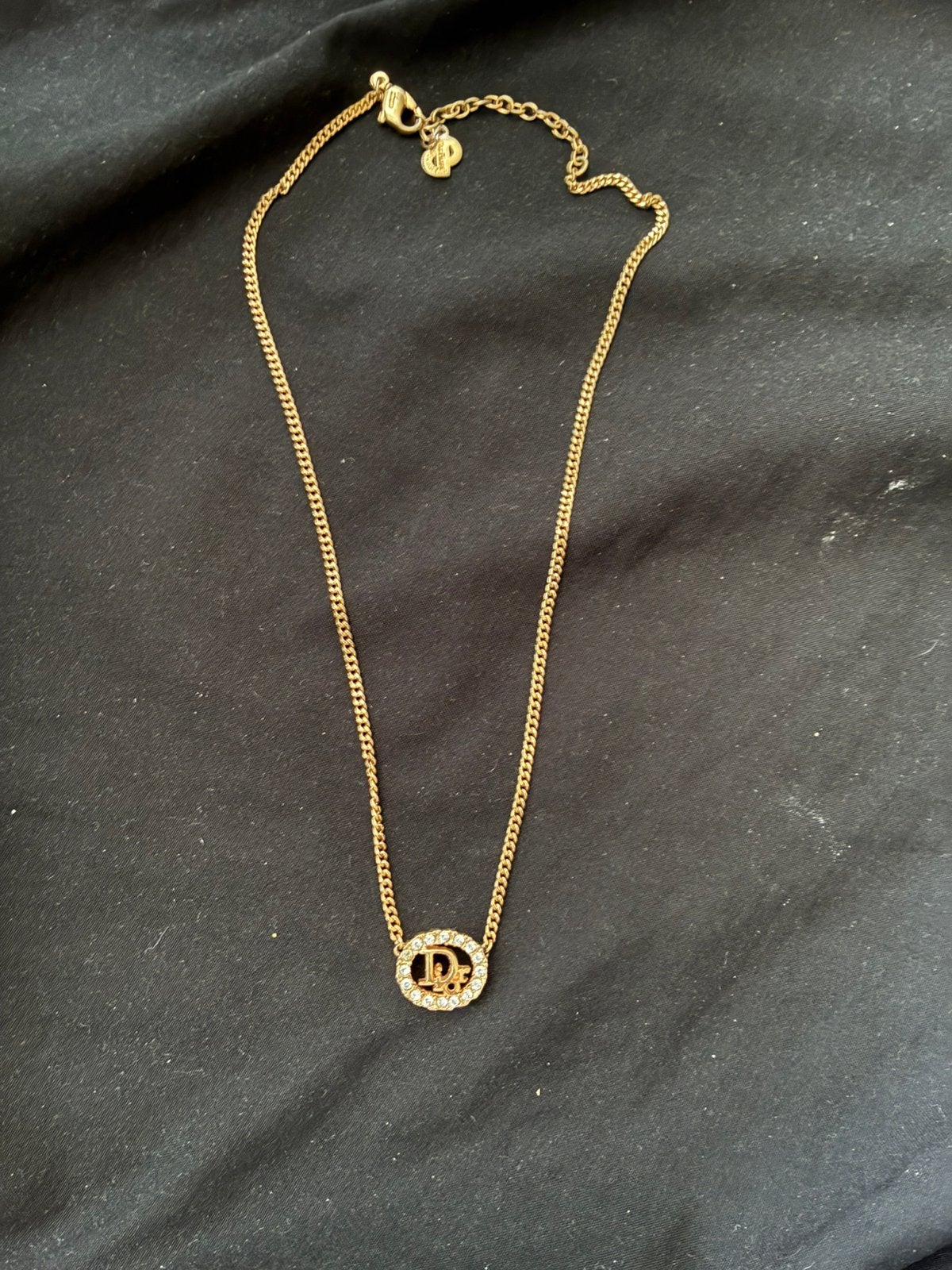 100% Authentiek ronde ovale DIOR gouden Ketting, Ophalen of Verzenden, Zo goed als nieuw, Goud, Overige materialen