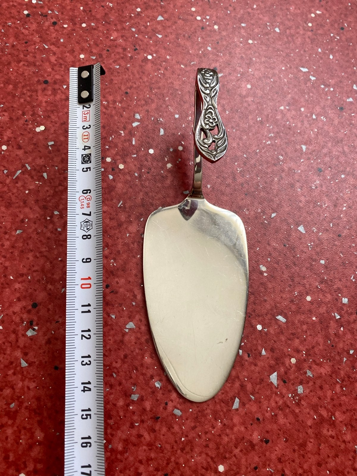 Zilverkleurige taartschep met sierlijk handvat Gero, Antiek en Kunst, Ophalen of Verzenden