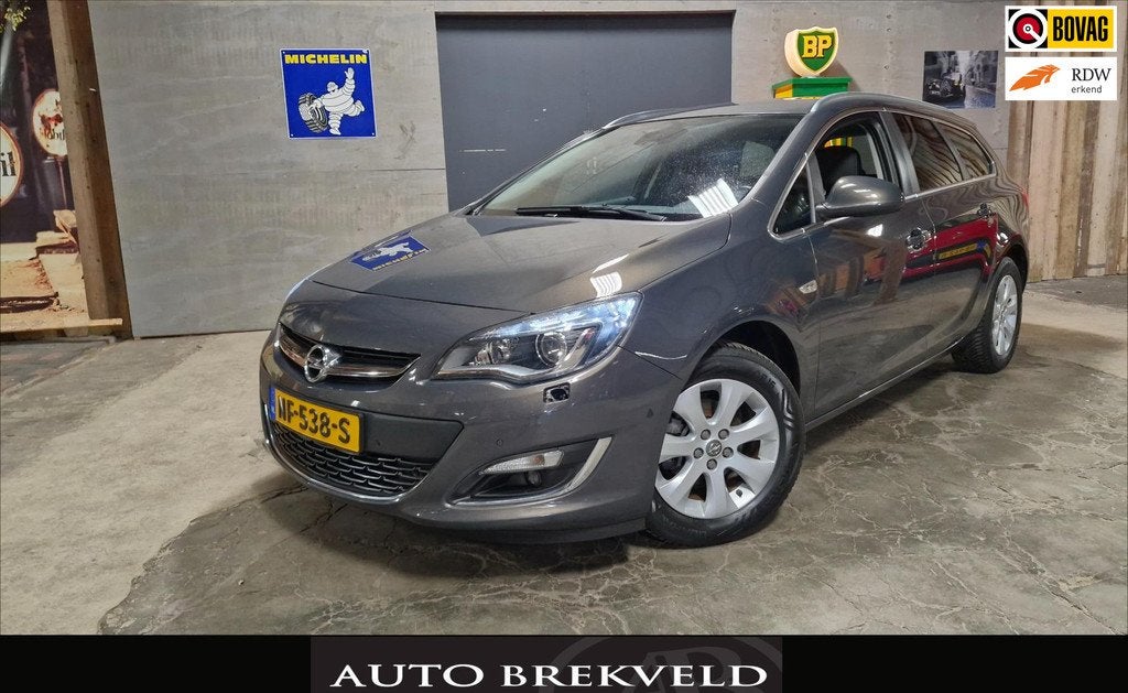 Opel Astra Sports Tourer 1.4 Turbo Business + 140PK | Rijkla, Auto's, Voorwielaandrijving, Stof, Gebruikt, 4 cilinders