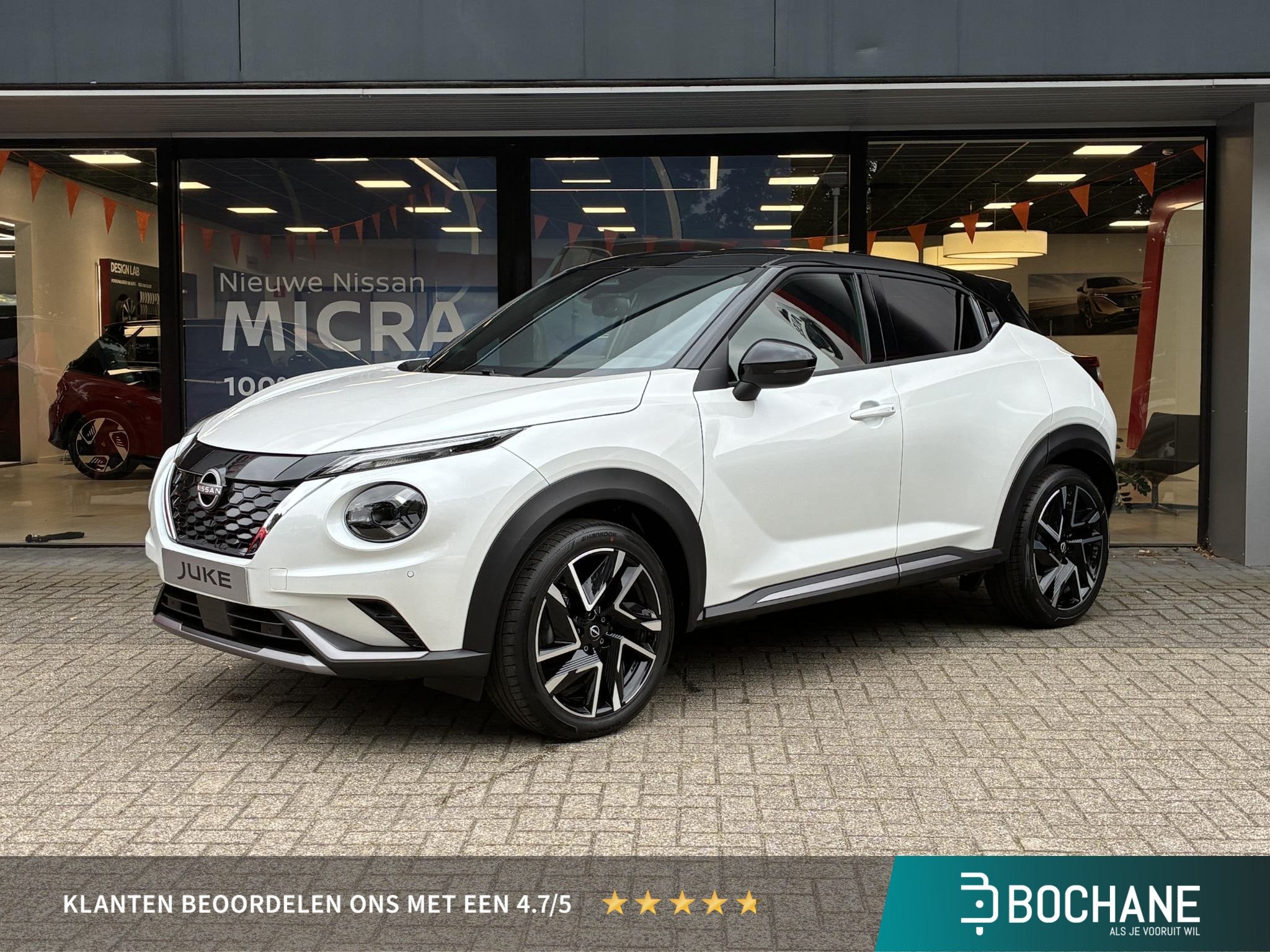 Nissan Juke 1.0 DIG-T N-Design NIEUW UIT VOORRAAD LEVERBAAR, Auto's, Stof, Met garantie (alle), Wit, Bedrijf
