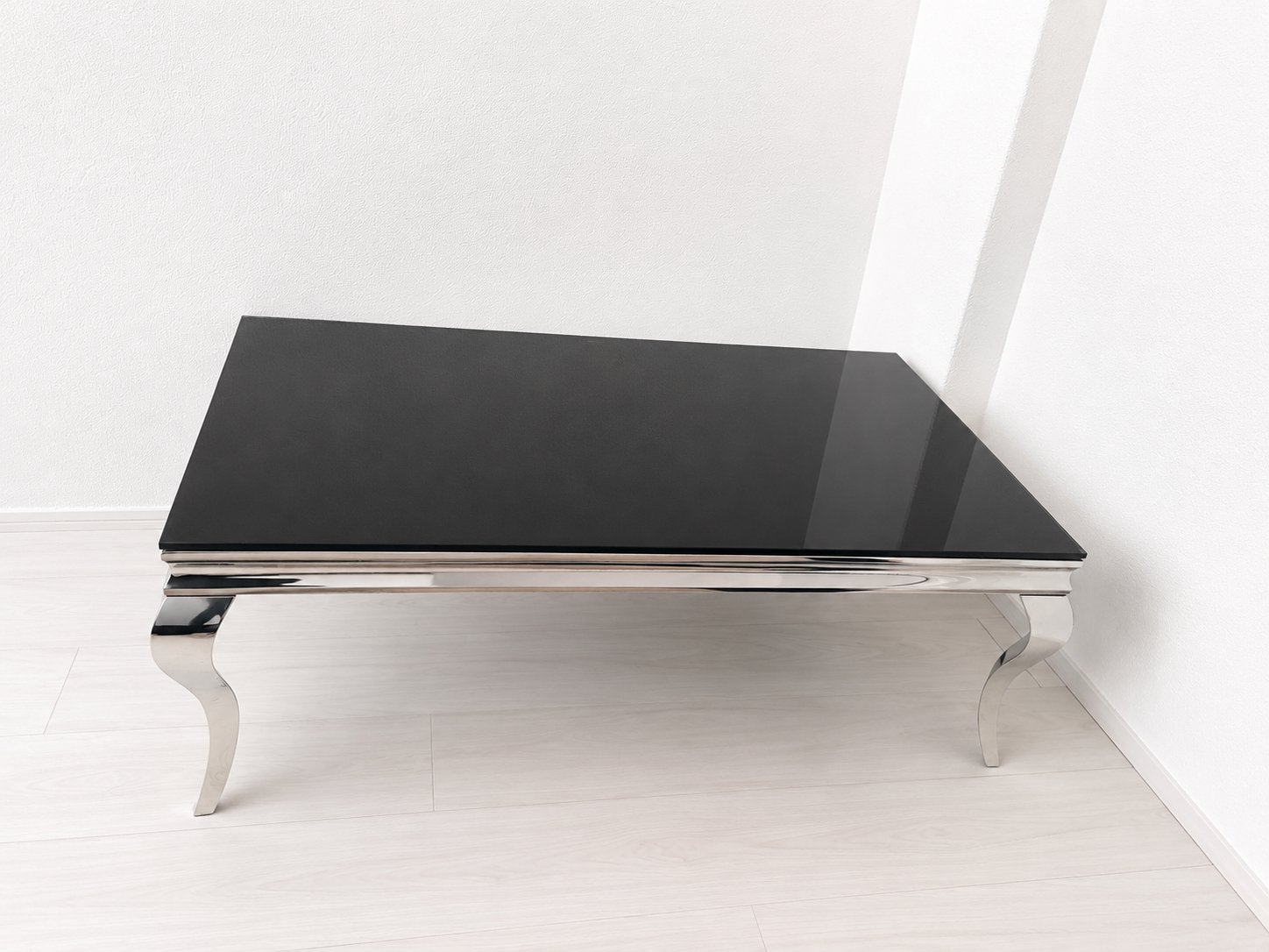 Salontafel 130x70 - Zwart glas met zilveren poten, Ophalen, 100 tot 150 cm, 50 tot 100 cm, Rechthoekig