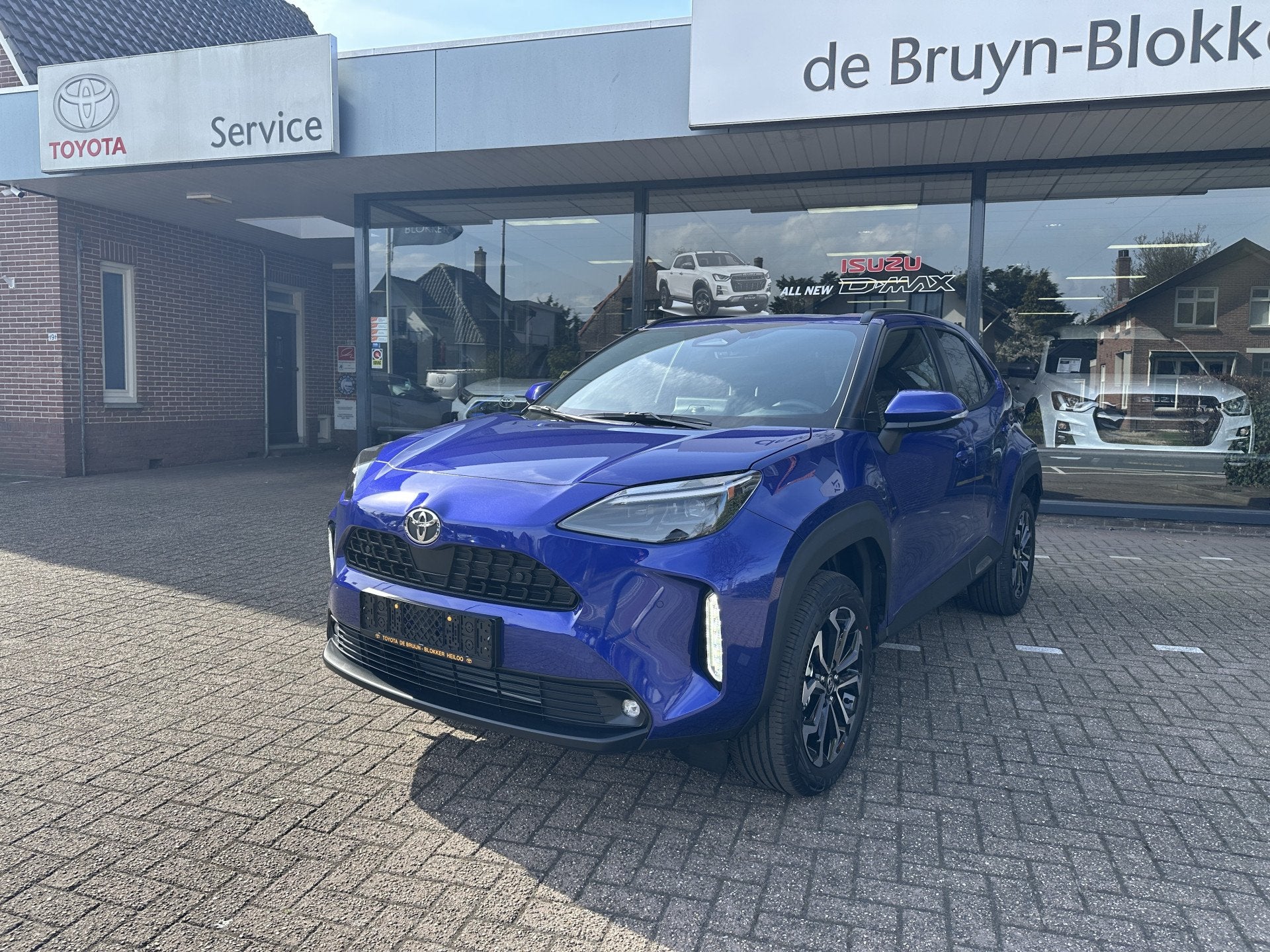 Toyota Yaris Cross 1.5 Hybrid 115 Dynamic Apple Carplay / An, 12 maanden, Gebruikt, Zwart, Blauw
