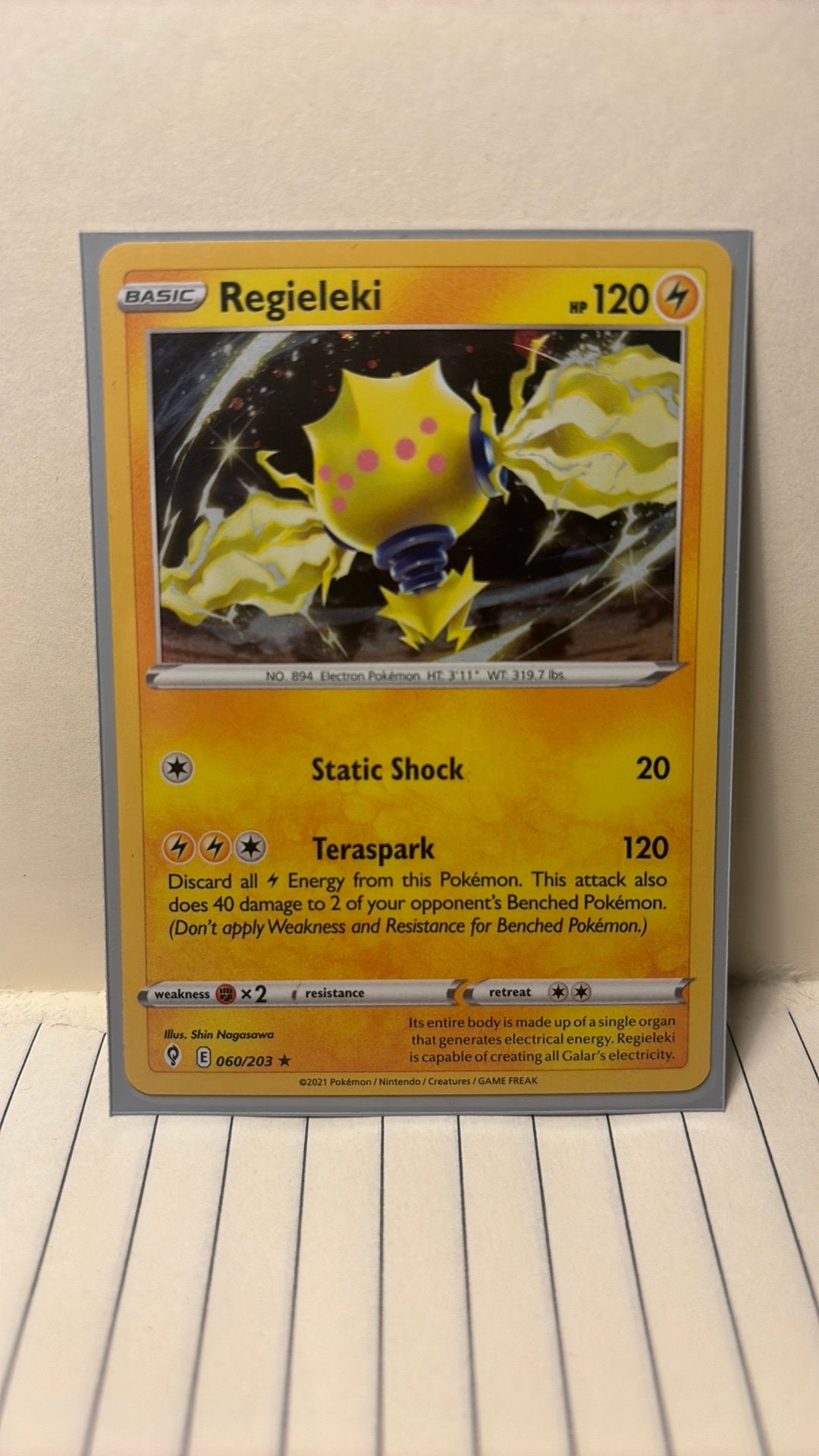 Regieleki 060/203 evolving skies reverse holo pokemon kaart, Ophalen of Verzenden, Nieuw, Boosterbox