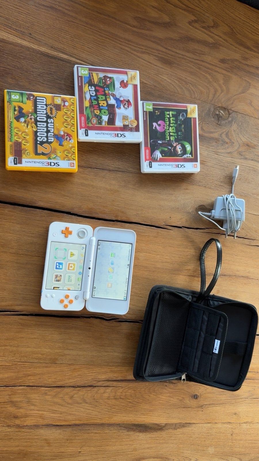 Nintendo 2DS XL, Ophalen, Zo goed als nieuw, Met beschermhoes of tas, Wit
